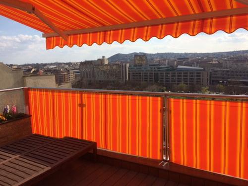 Nyerő páros az erkélyre: copertină és napfogó